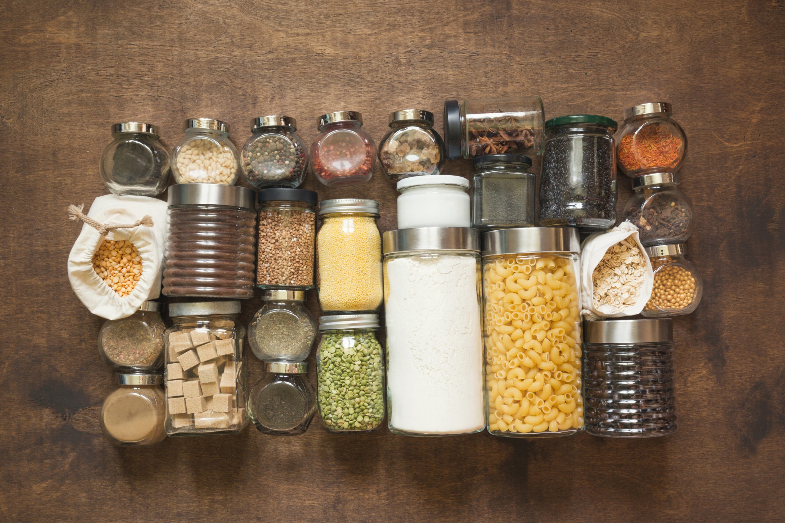 Homemade set of cereals, pasta, spices, coffee, flour, sugar storage